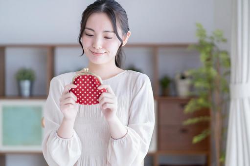 いらないプレゼントを高く売るコツを実践した女性